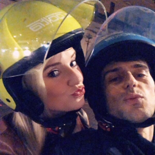 Girl and boy on vespa