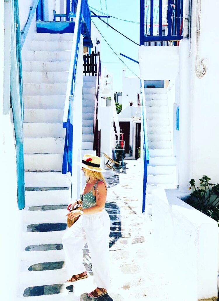 Walking up stairs in Santorini.