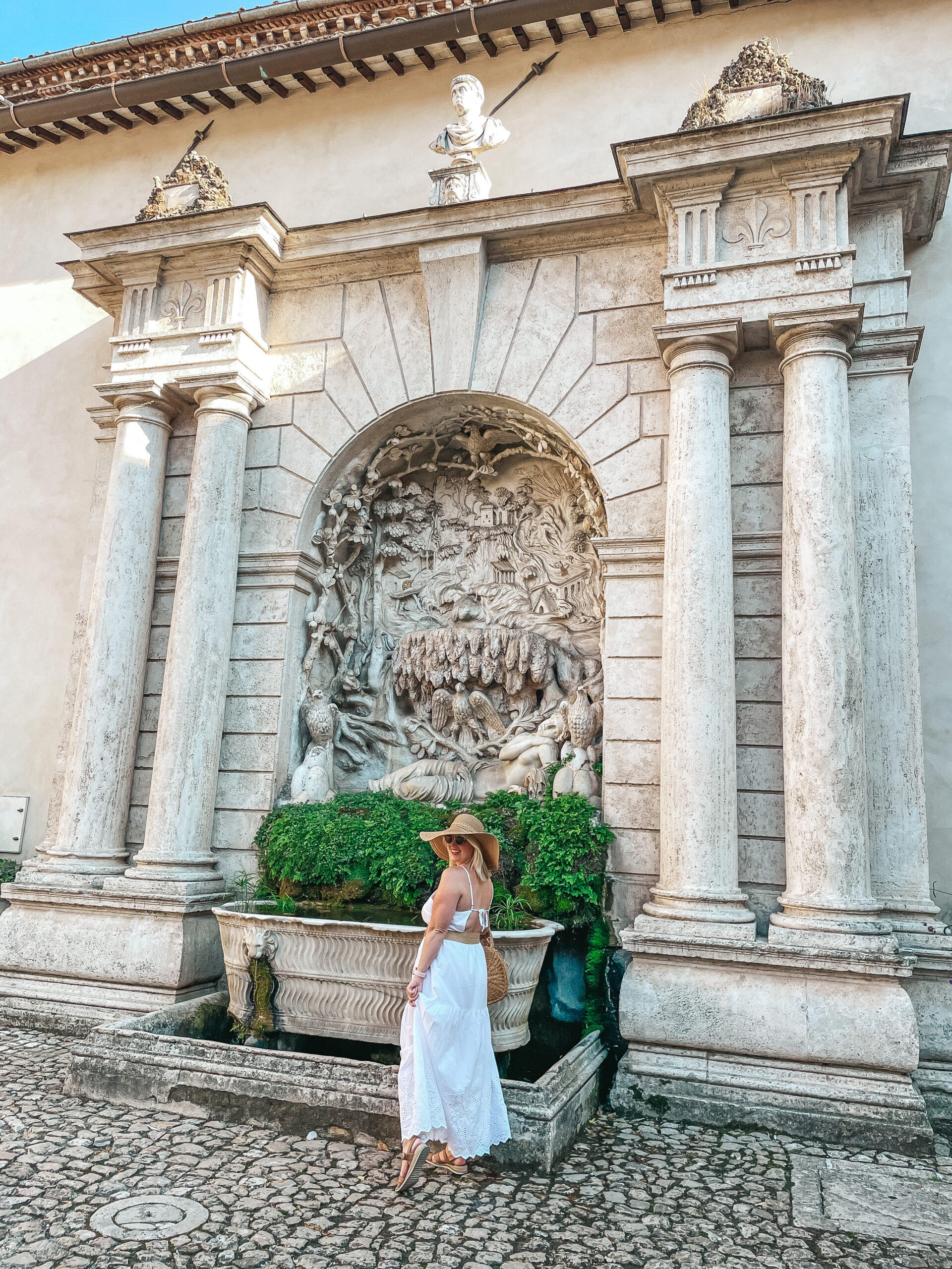 Woman in front of fountain bath